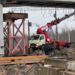 На Петрозаводском шоссе надвинули 45 метров металлоконструкций пролетного строения над жд путями